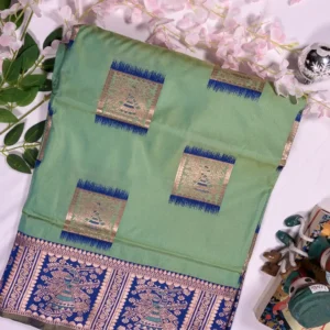 mint green baluchori silk saree with royal blue dancing motif border