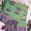mint green baluchori silk saree with royal blue dancing motif border