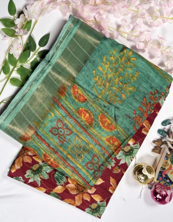 soft slab linen saree with artistic floral motifs & tassels